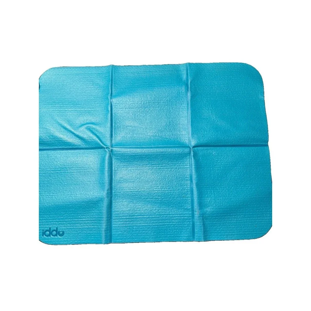 Ubbi On-The-Go Baby Diaper Changing Mat, Portable Foldable Travel Pad
